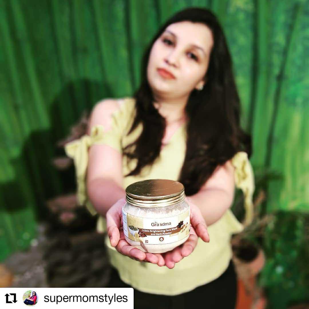 @supermomstyles holding ByGrandma Bath Powder